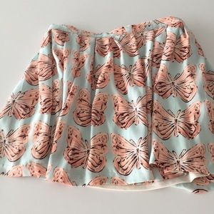 Butterfly mini skirt.